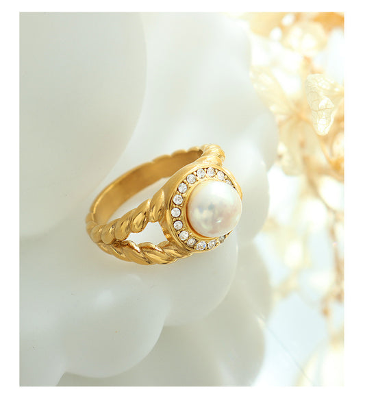 Retro high-quality zircon and freshwater pearl inlaid ring female titanium steel gold-plated ring wholesale