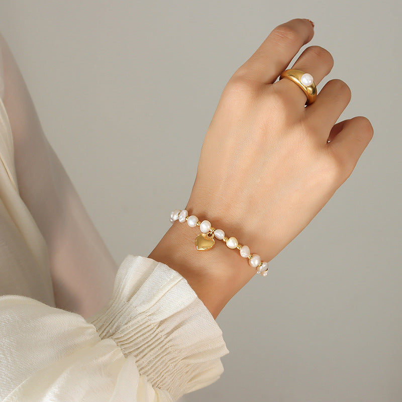 Fresh water pearl splicing steel ball bracelet, female fashion, creative design, heart charm bracelet